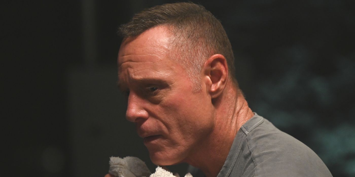 Hank Voight, played by Jason Beghe, seen in close-up wearing a grey shirt in Chicago PD Season 12