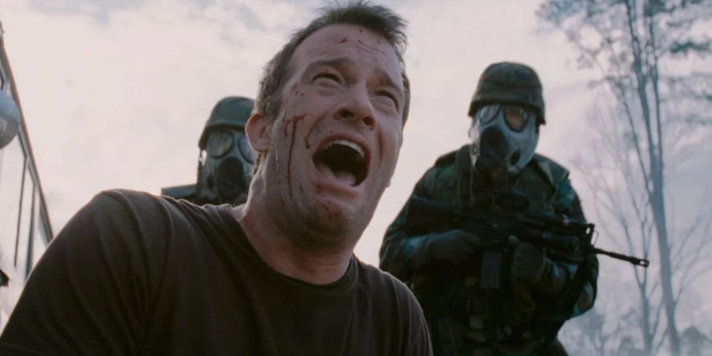 David (Thomas Jane) collapses as military men approach in The Mist.