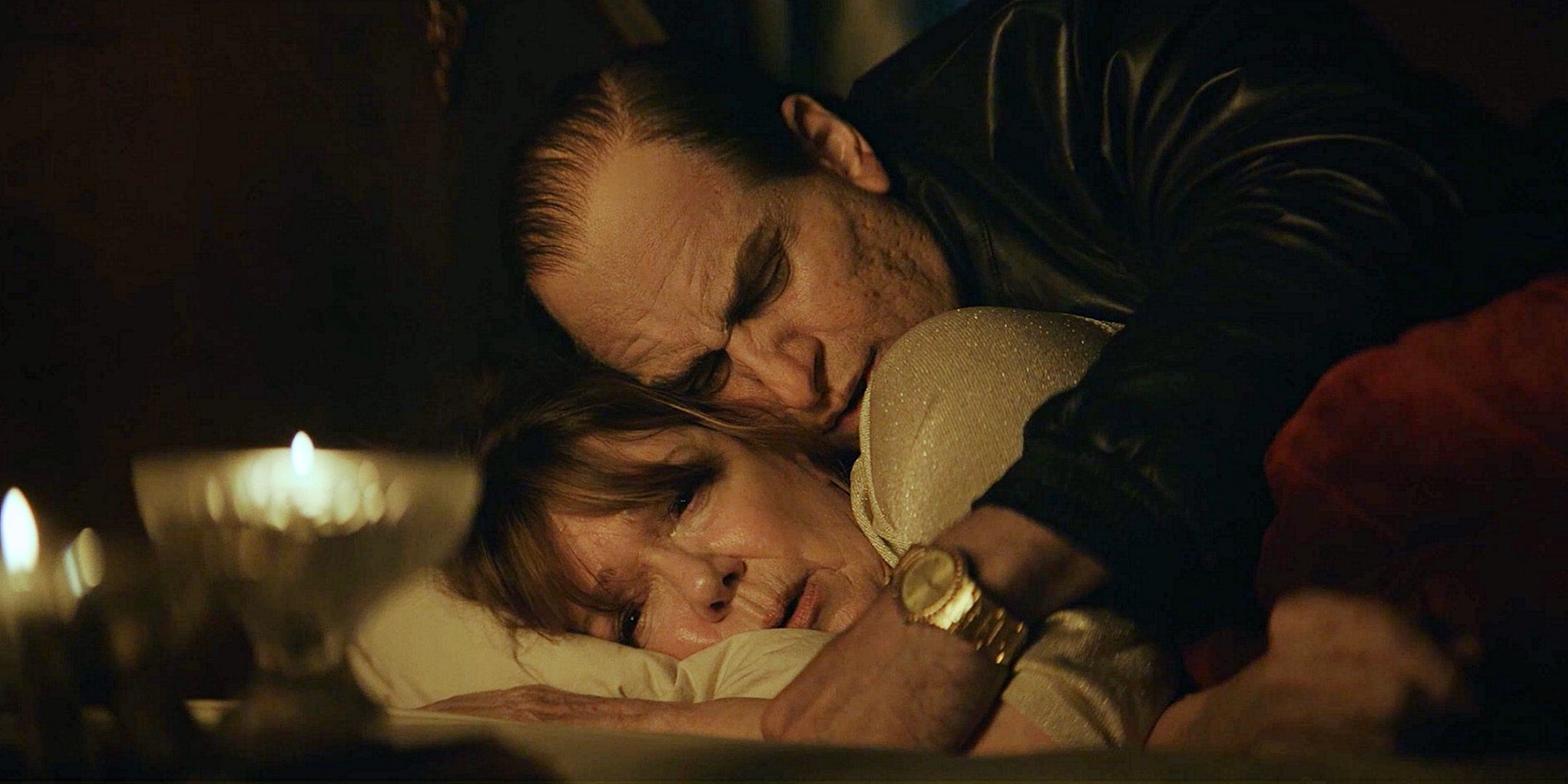 Dierdre O'Connell as Francis and Colin Farrell as Oz Cobb lying in bed together from The Penguin series HBO