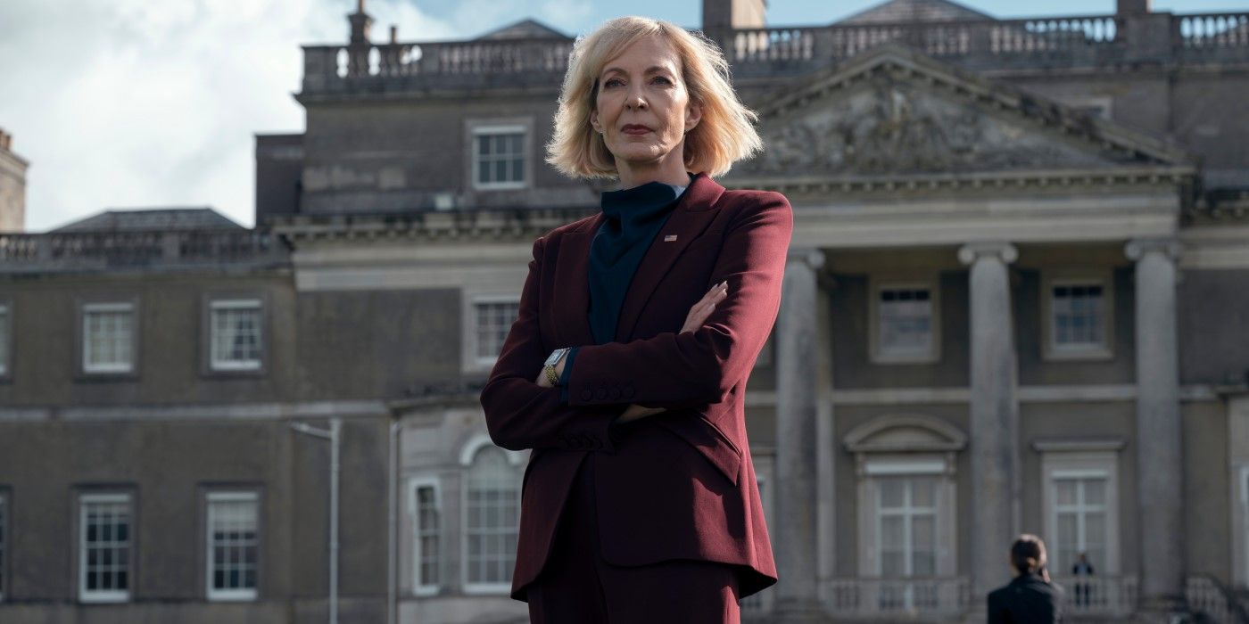 Grace Penn, played by Allison Janney, wearing a maroon suit while standing in The Diplomat Season 2