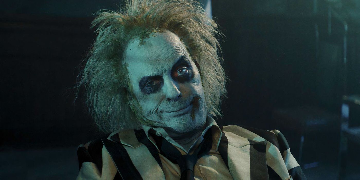 Michael Keaton as Beetlejuice talking to ghostly authorities about his former relationship in Beetlejuice Beetlejuice.