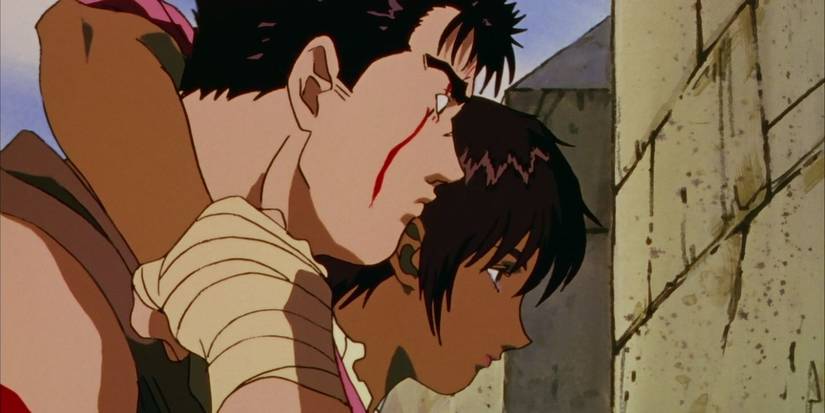 Guts helping Casca up after the Battle of Doldrey in the anime Berserk.