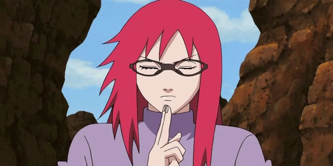 Karin is focusing while using hand signs in Naruto: Shippuden.