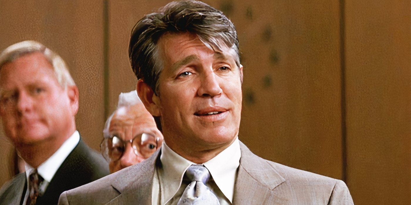 Eric Roberts as Salvatore Maroni standing trial against Harvey Dent and has rigged the trial to his favor in The Dark Knight.