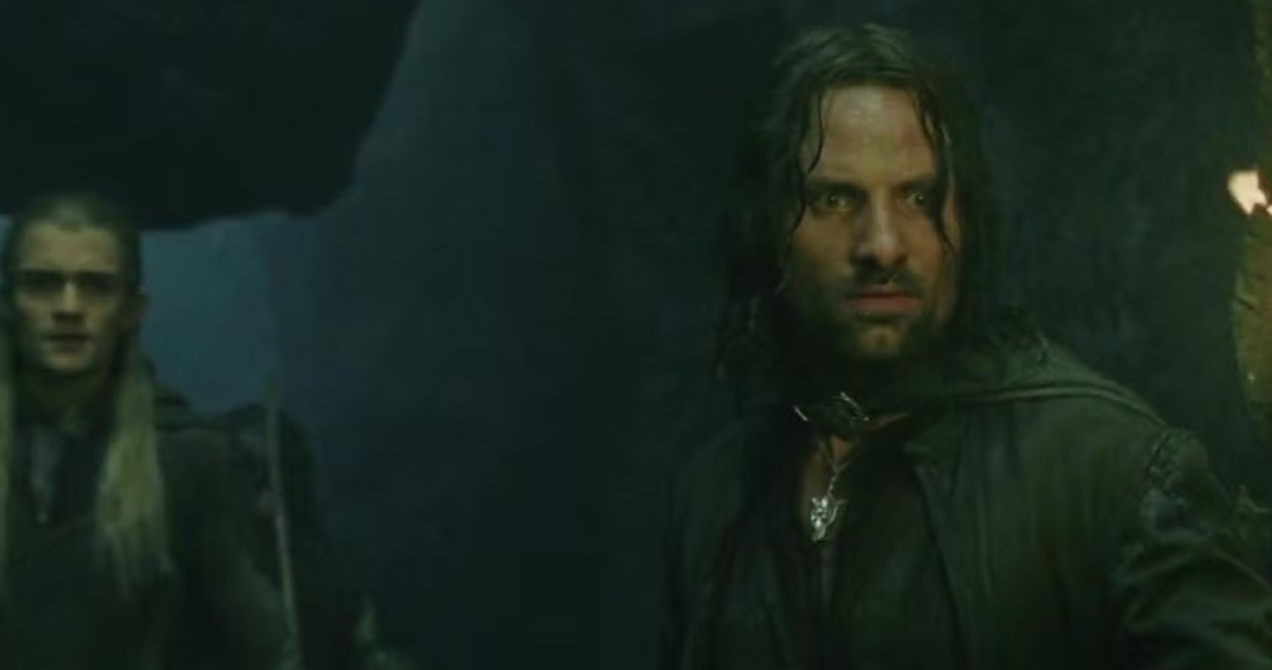 Aragorn inspects the Paths of the Dead wondering which way to go in Return of the King.