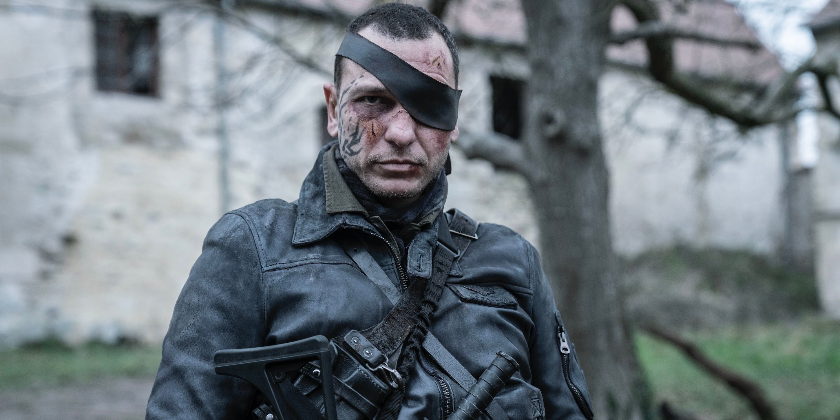 Codron, played by actor Romain Levi, wears a black leather jacket in The Walking Dead: Daryl Dixon