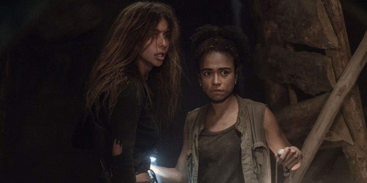 Connie und Magna aus The Walking Dead sehen in einer Höhle verängstigt aus.