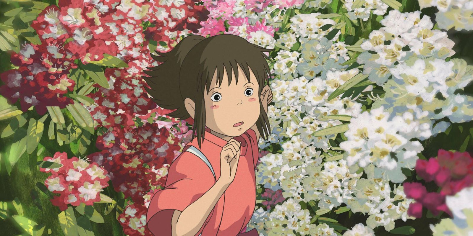 Chihiro runs through an abundance of flowers in Studio Ghibli's Spirited Away