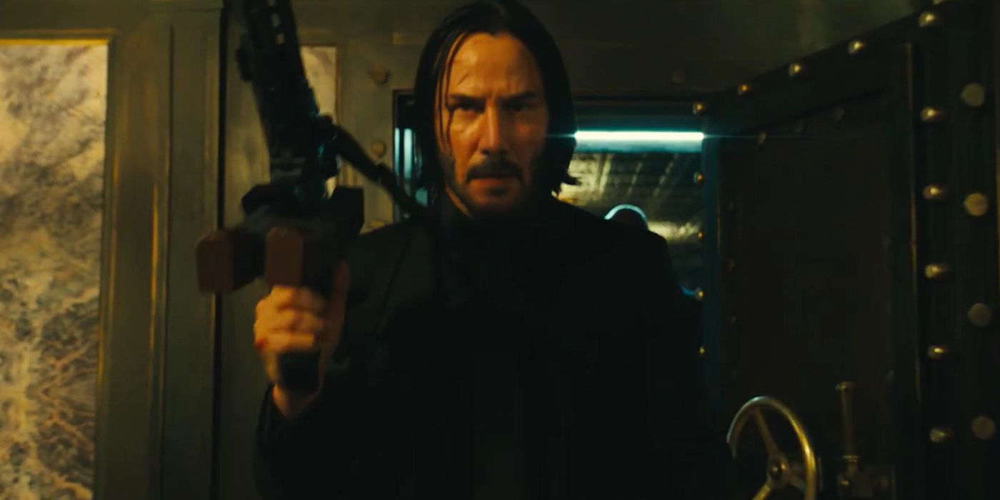 John Wick walks out with a rifle in John Wick 3 Parabellum.