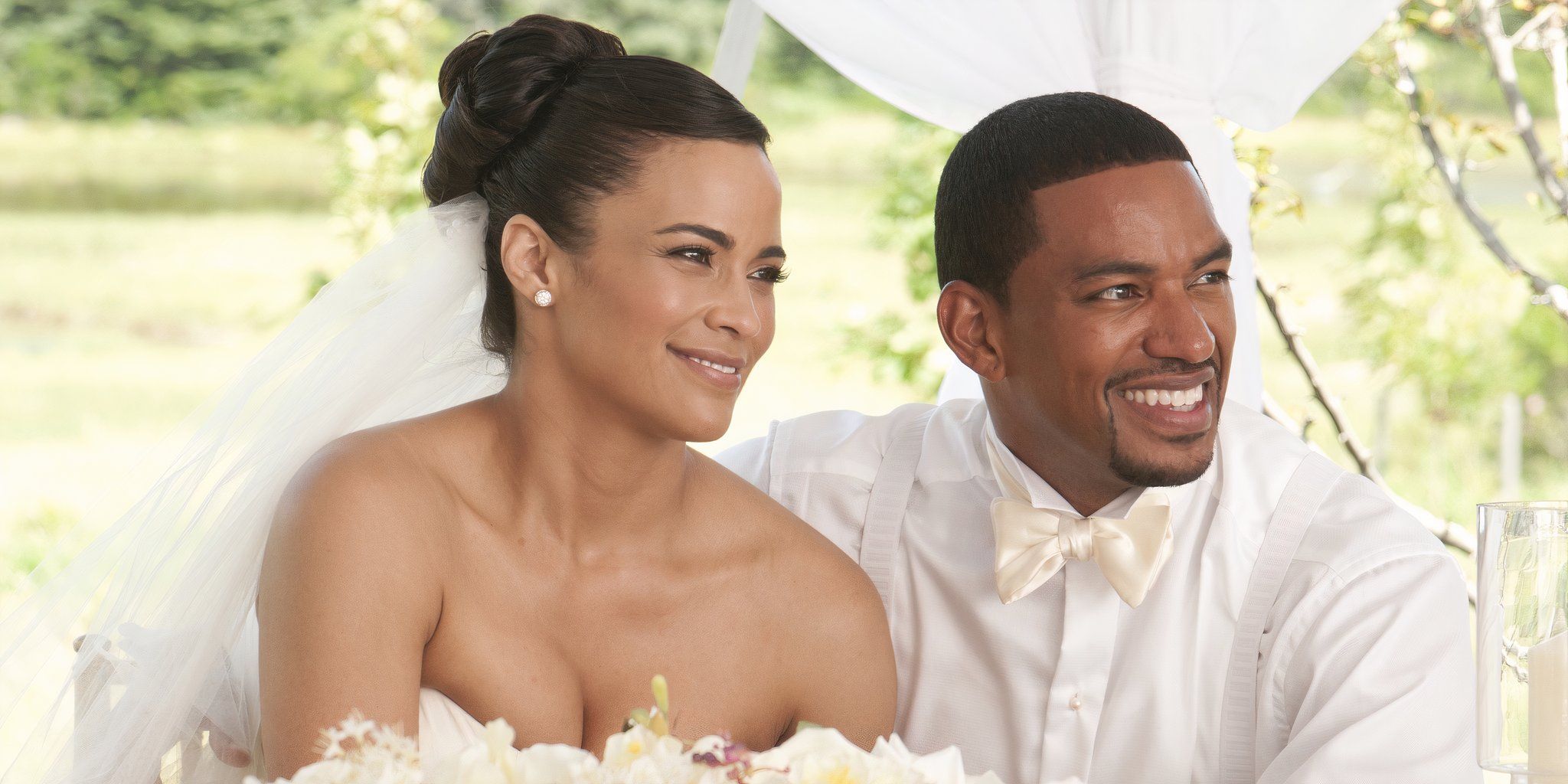 Sabrina and Jason are happy at their wedding in Jumping the Broom