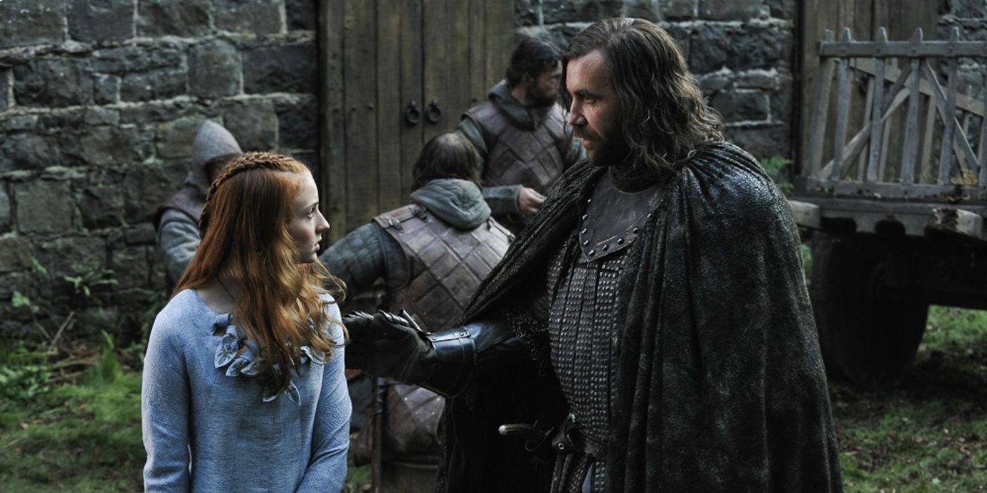 Uma jovem Sansa Stark está ao lado de Sandor "The Hound" Clegane em Game of Thrones