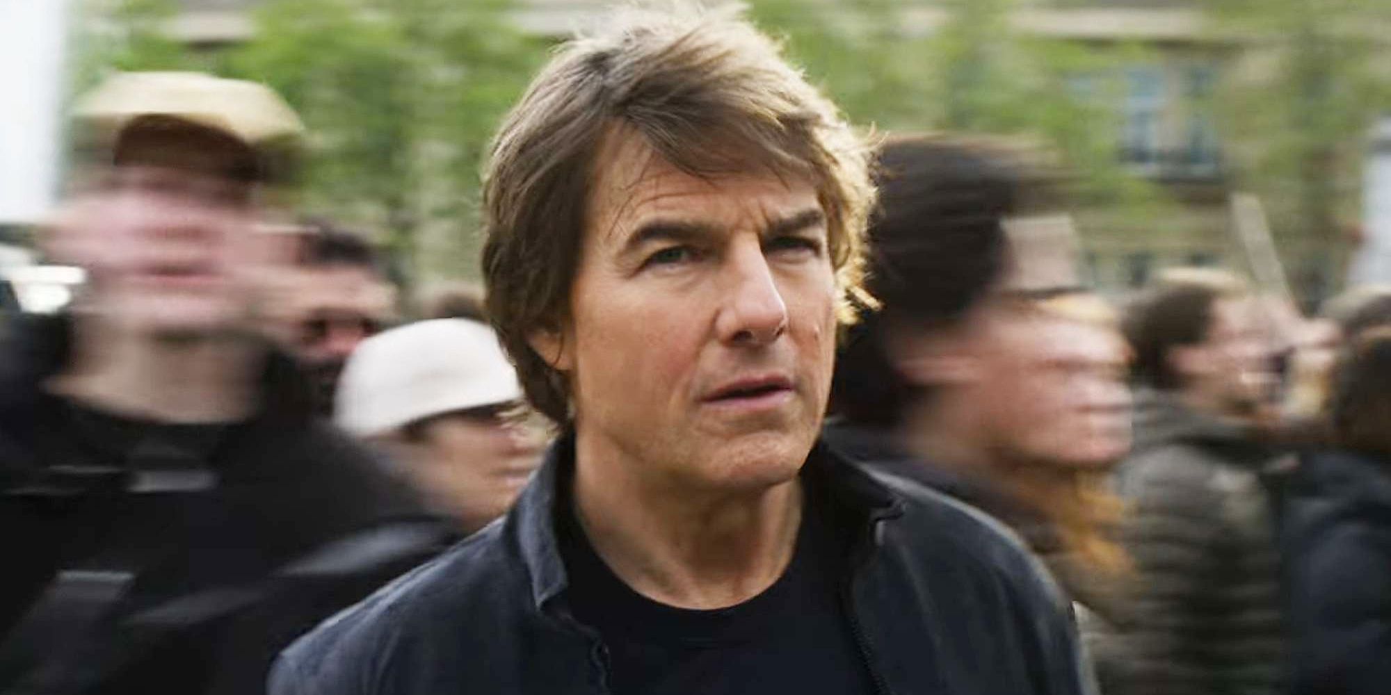 Tom Cruise surrounded by people in Mission Impossible 8 The Final Reckoning