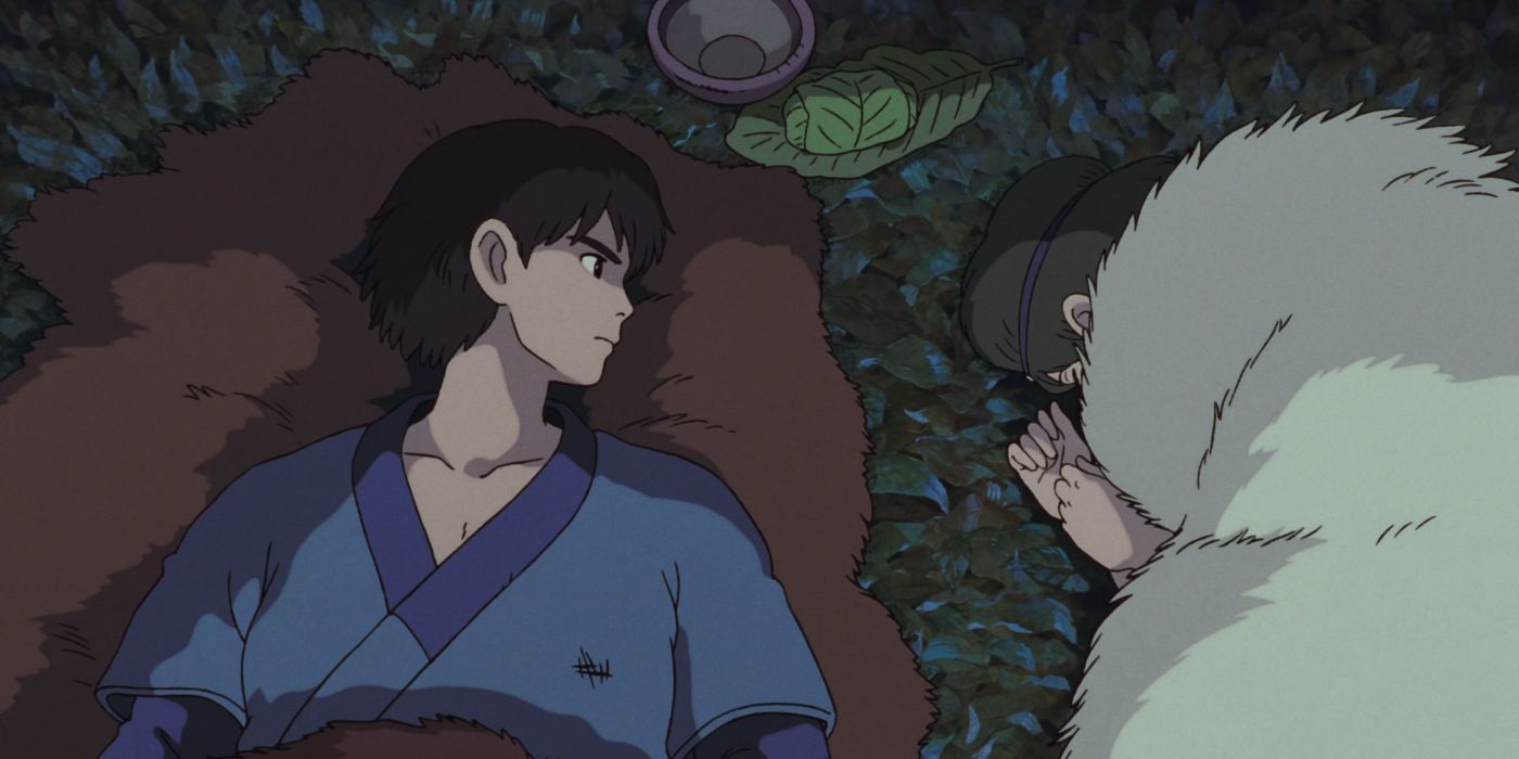 Ashitaka deitado ao lado de San em uma caverna em Princesa Mononoke.