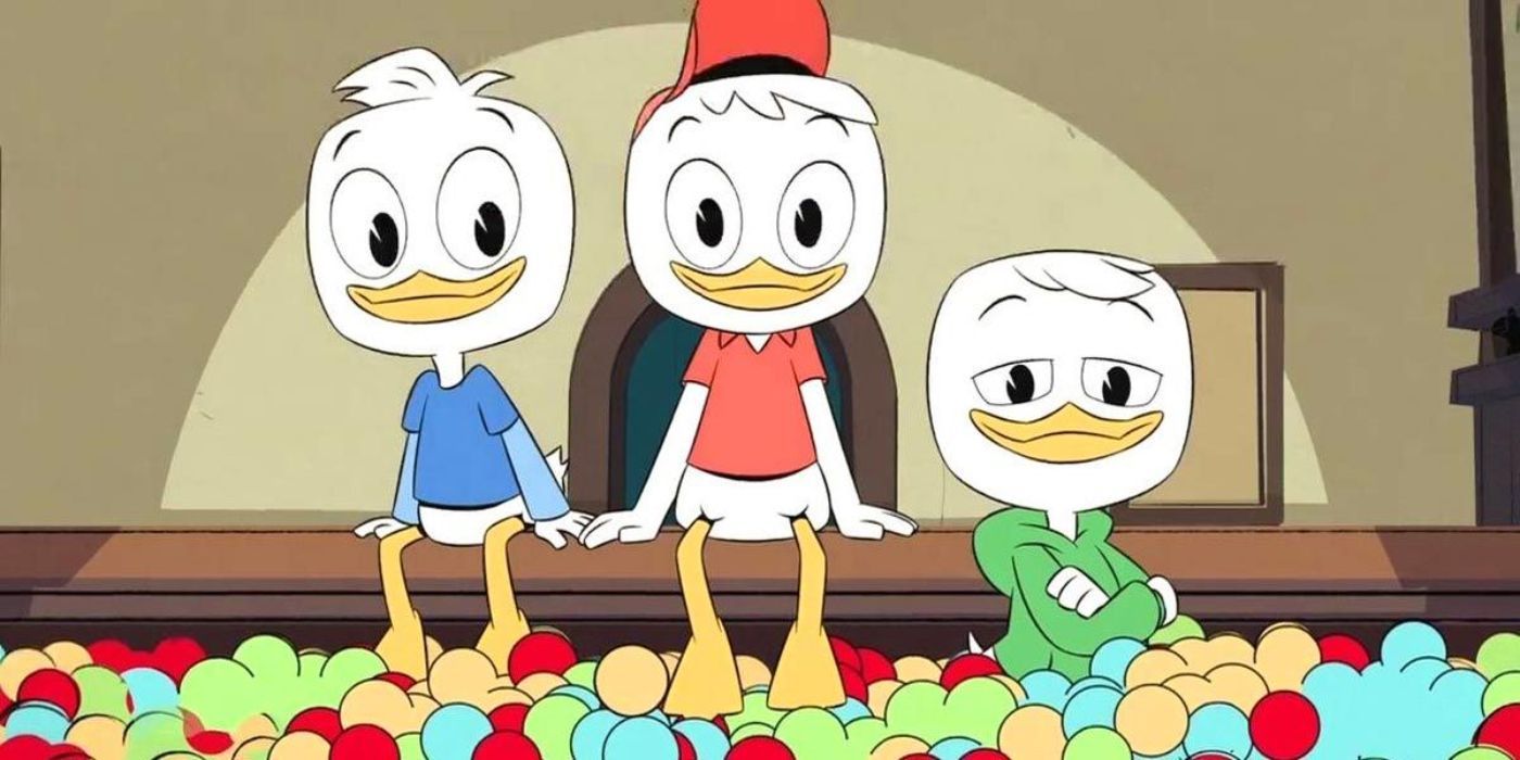 Huey, Dewey, and Louie from DuckTales sit in a ball pit.