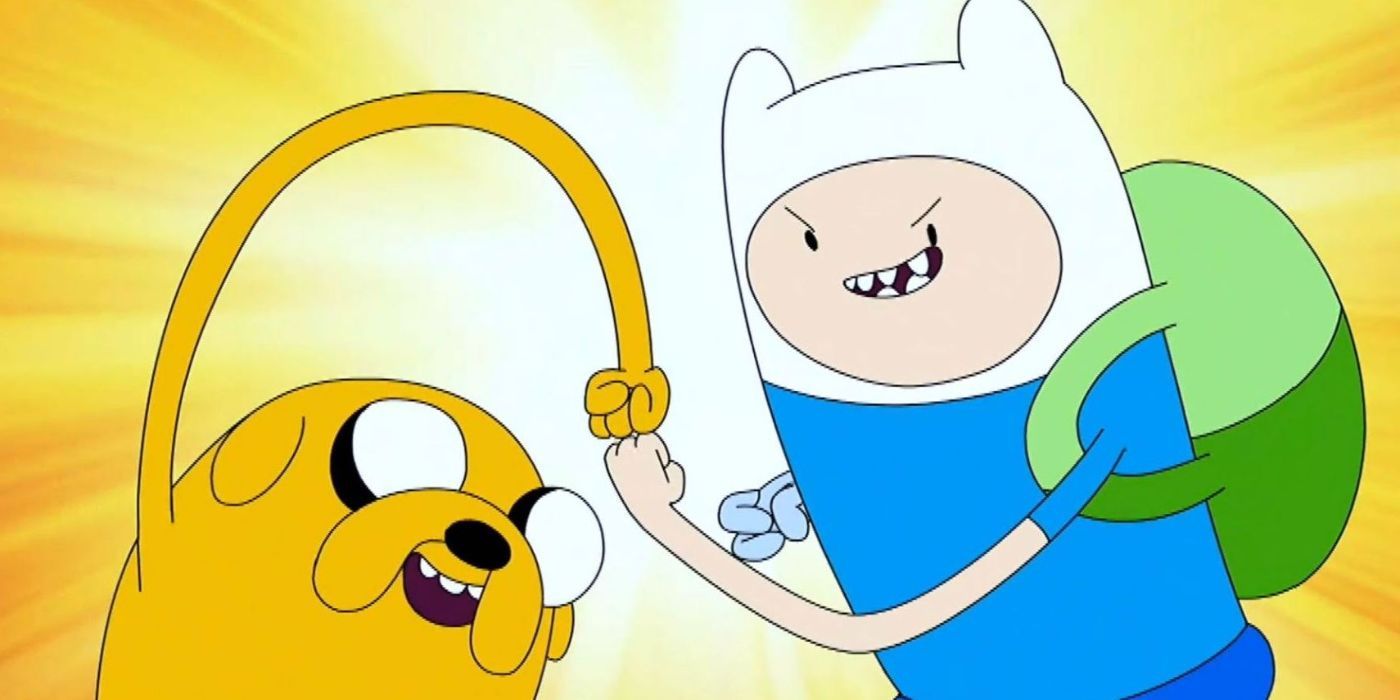 Finn and Jake from Adventure Time are fist bumping.
