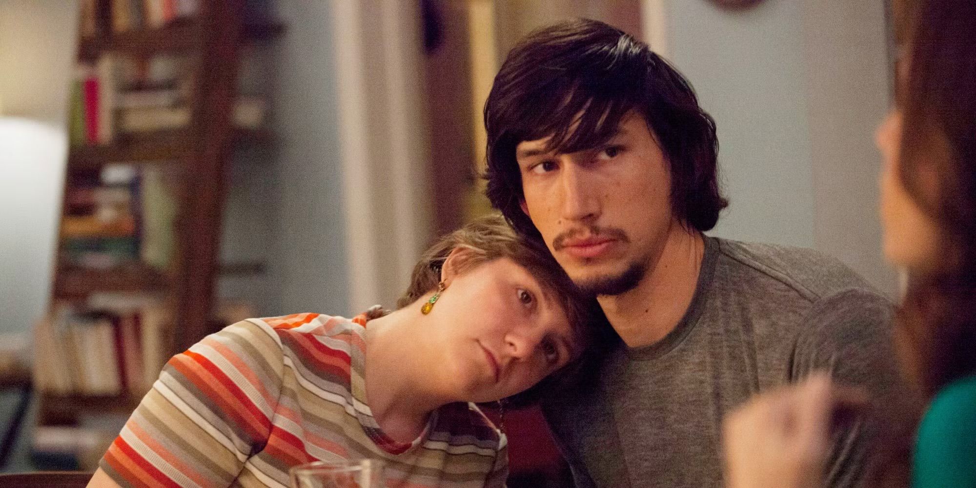 Hannah leans on Adam’s shoulder in Girls.