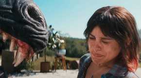 Jenna Ortega scared as a creature's jaws get near her Death of a Unicorn