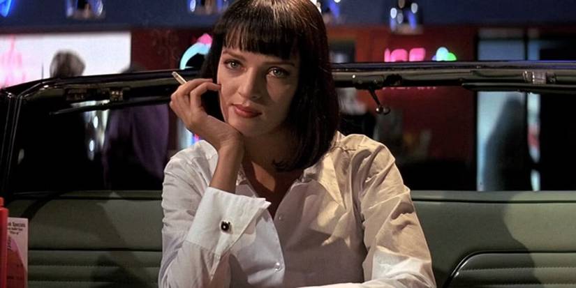 Mia Wallace holding a fictional fiction cigarette