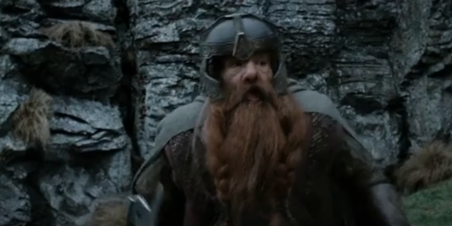 Gimli luta para continuar correndo com Legolas e Aragorn.