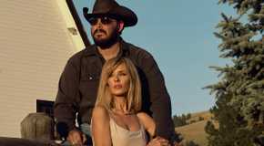 Rip and Beth take in a sunset on the Dutton Ranch in Yellowstone.