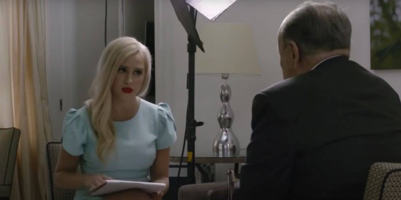 Maria Bakalova as Tutar Sagdiyev in disguise interviewing Rudy Giuliani from Borat 2