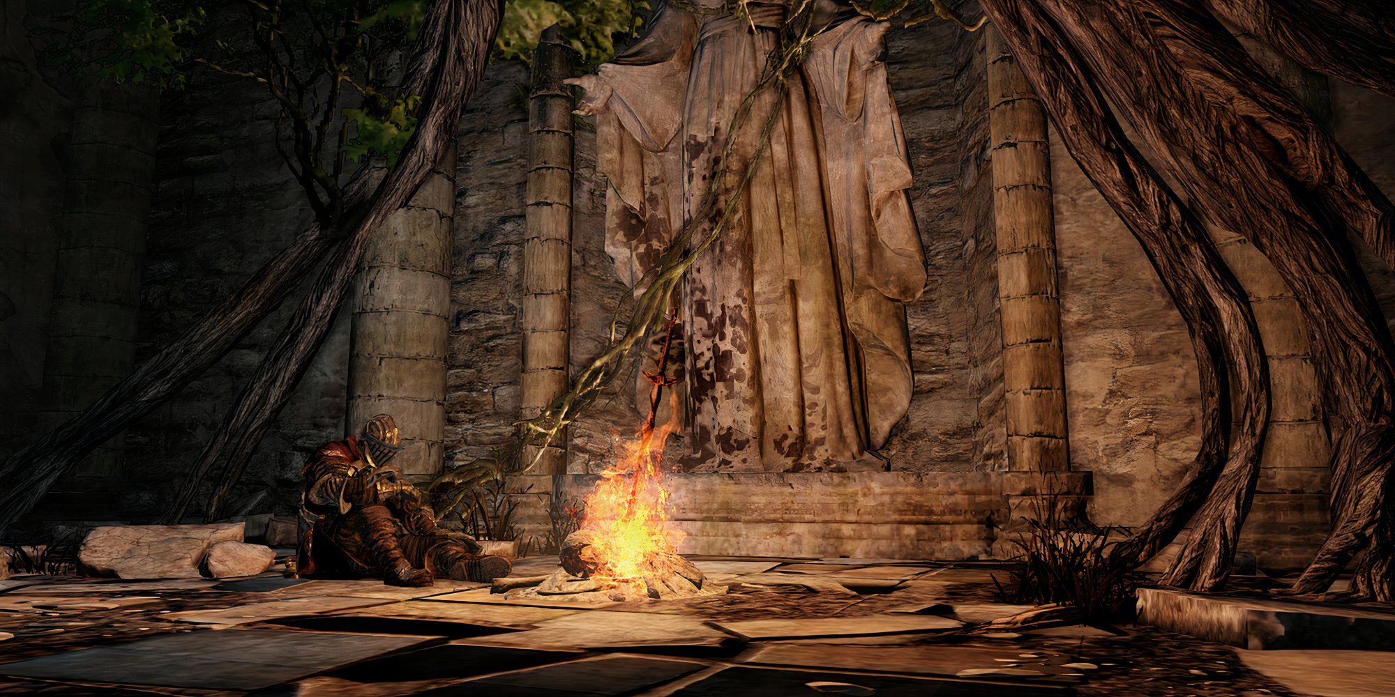 Dark Souls 2 jogador descansando na fogueira