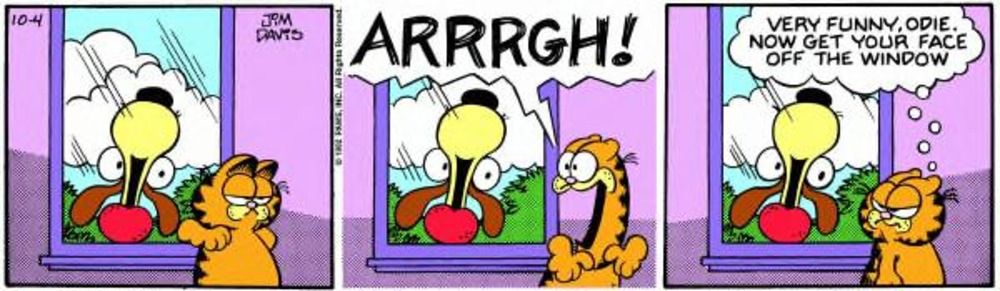 Garfield está assustado com o rosto de Odie estampado do lado de fora da janela.