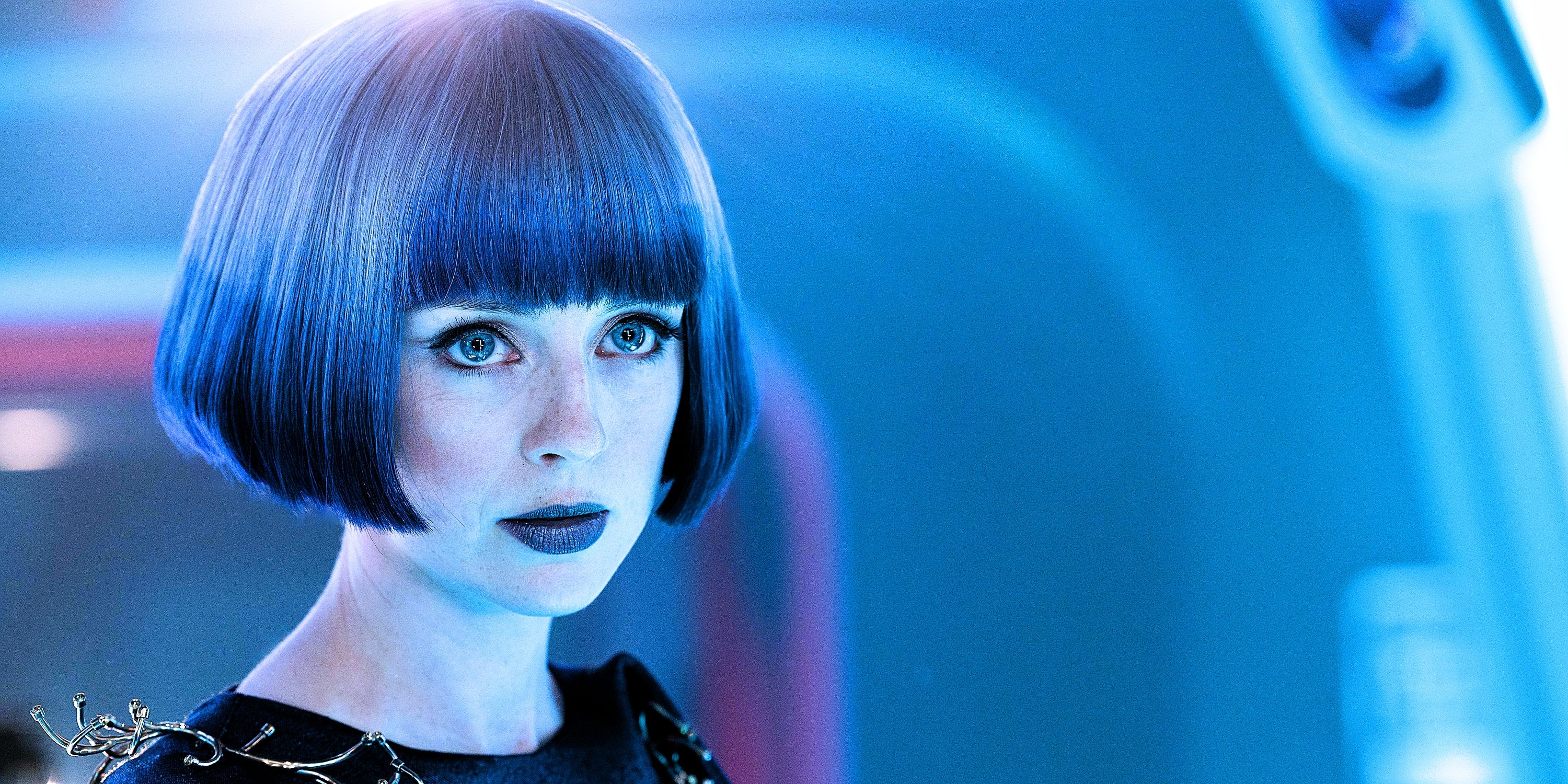 Rachel Garrett wearing a black dress with a blue bob haircut from Star Trek: Section 31 movie