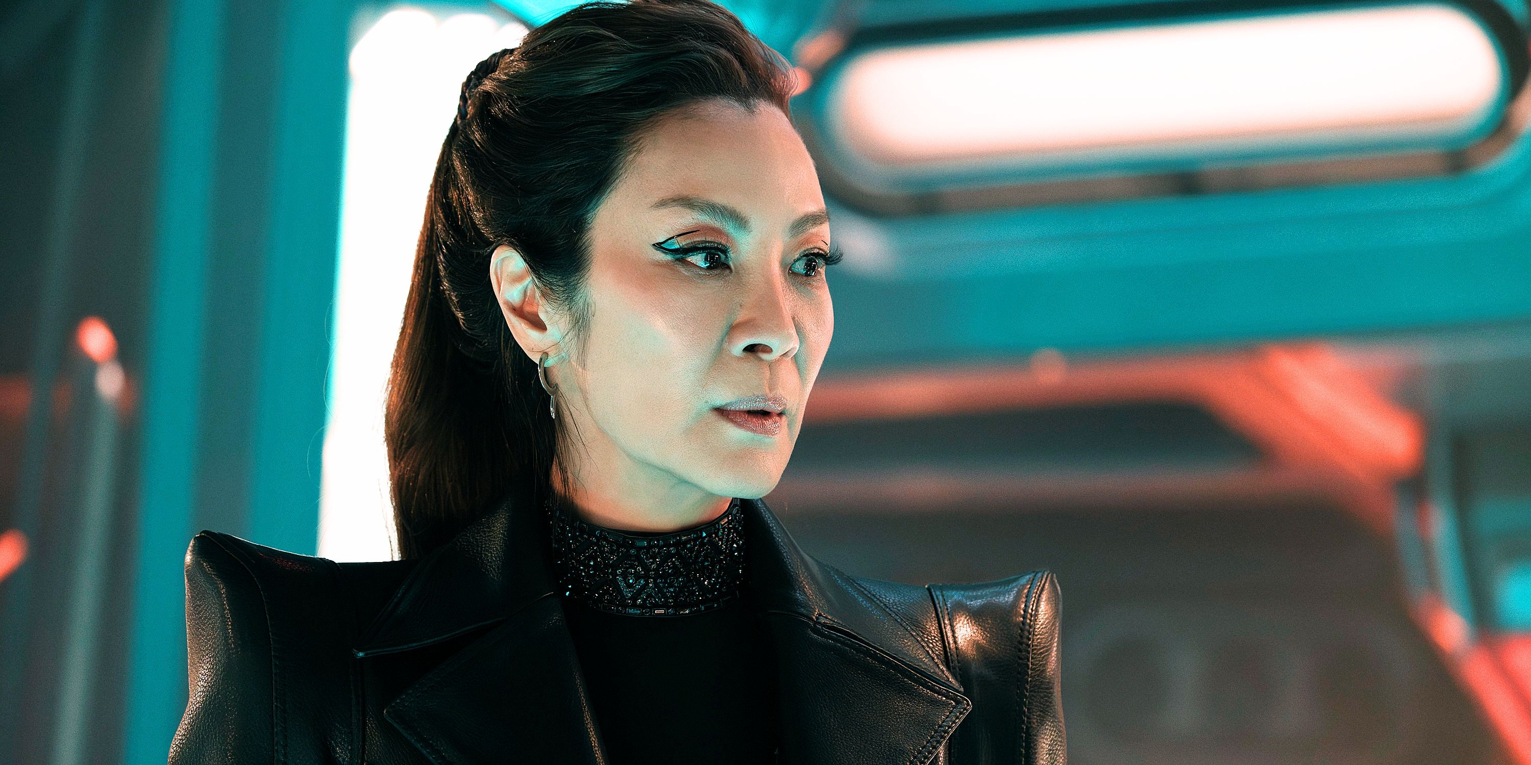 Michelle Yeoh as Philippa Georgiou in a black coat with pointy shoulders from Star Trek Section 31