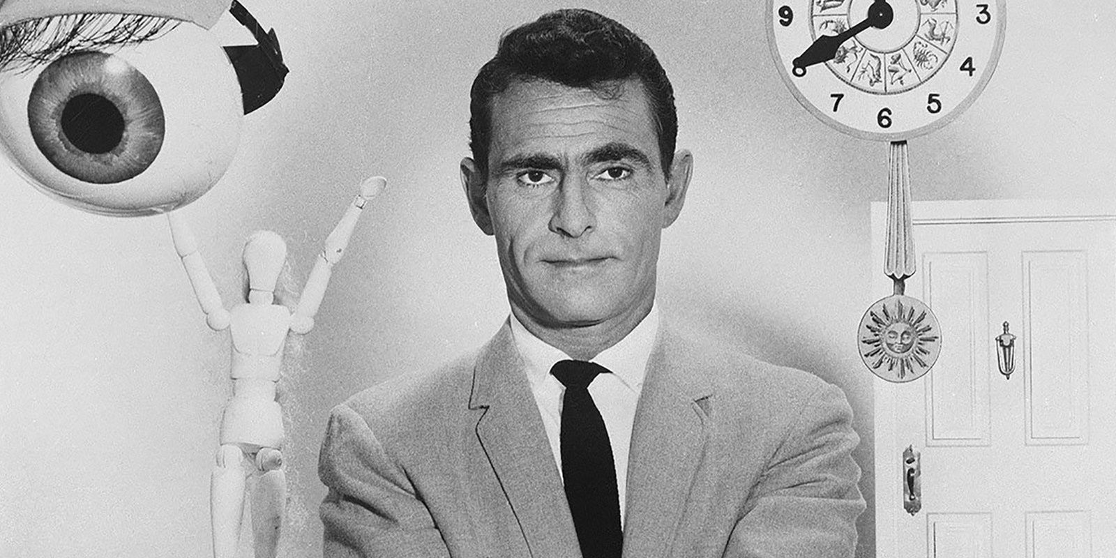 Rod Serling with Twilight Zone props behind him in The Twilight Zone