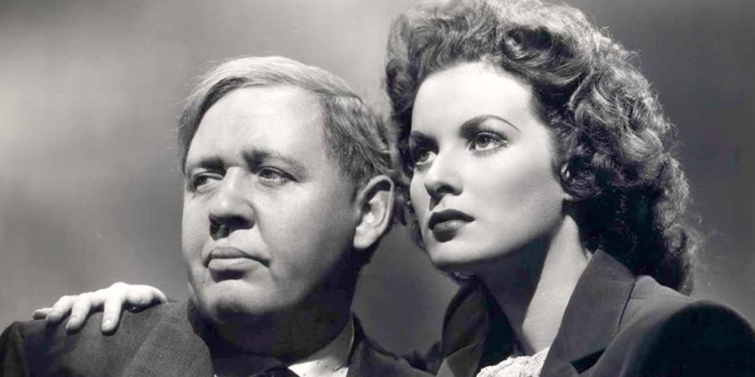 Maureen O'Hara e Charles Laughton ficam próximos um do outro em This Land is Mine.