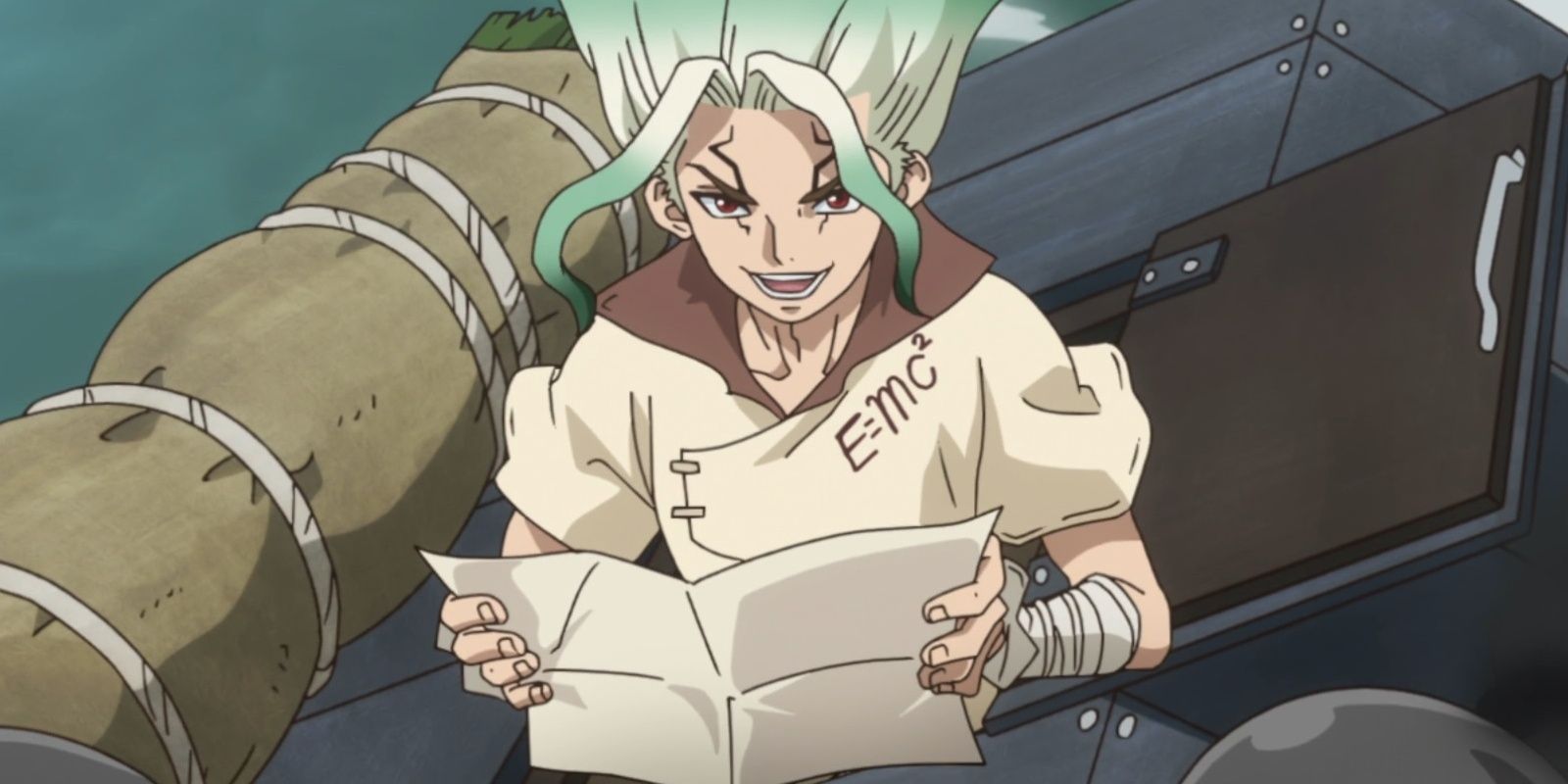 Senku fala segurando um mapa e vestindo uma blusa bege no anime Dr. Stone