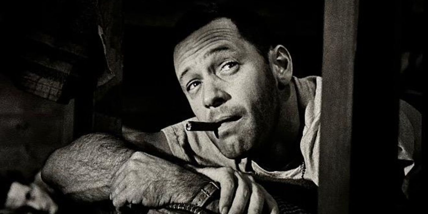 William Holden as J.J. Sefton from Stalag 17