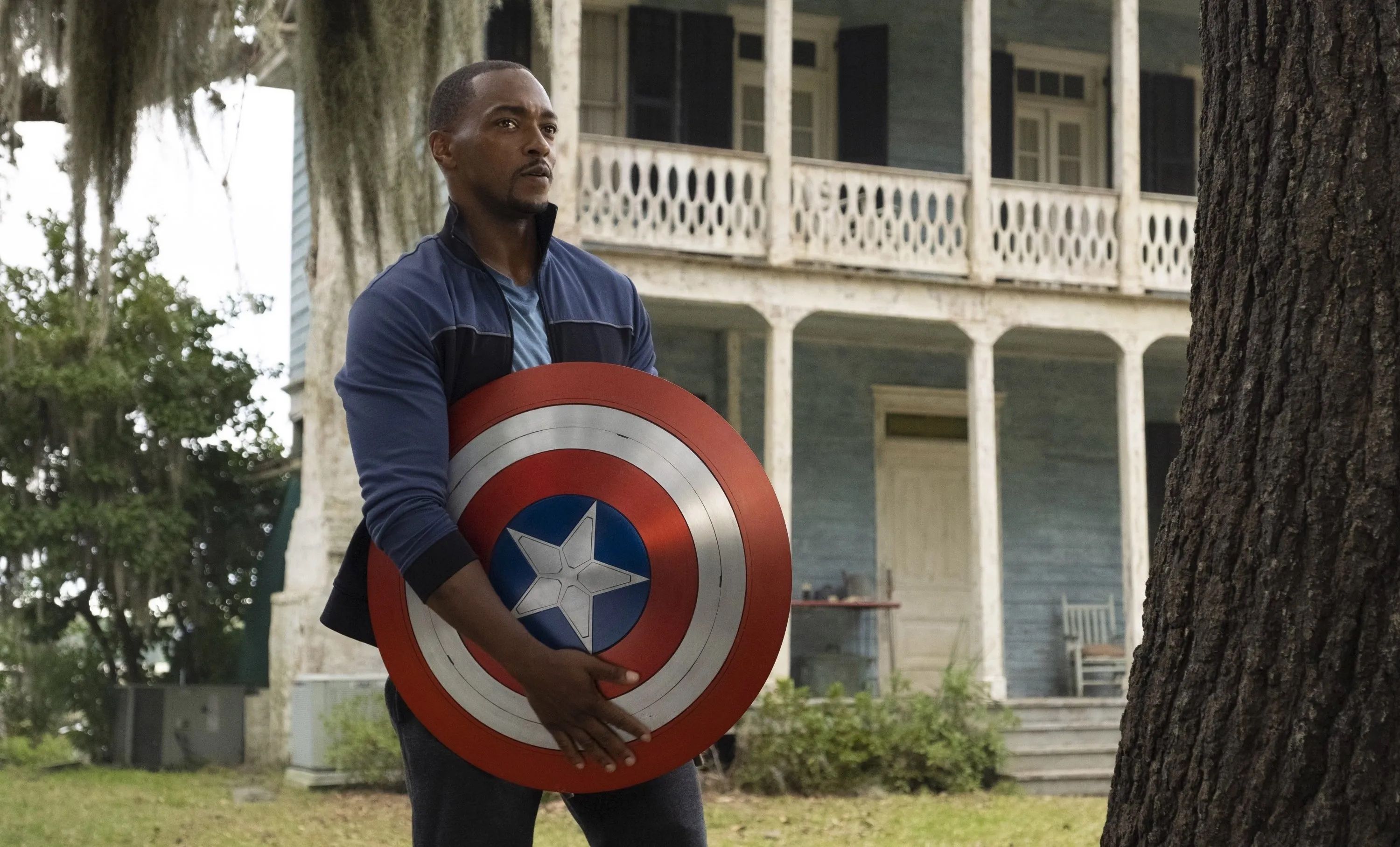 Anthony Mackie holding Captain America's Shield