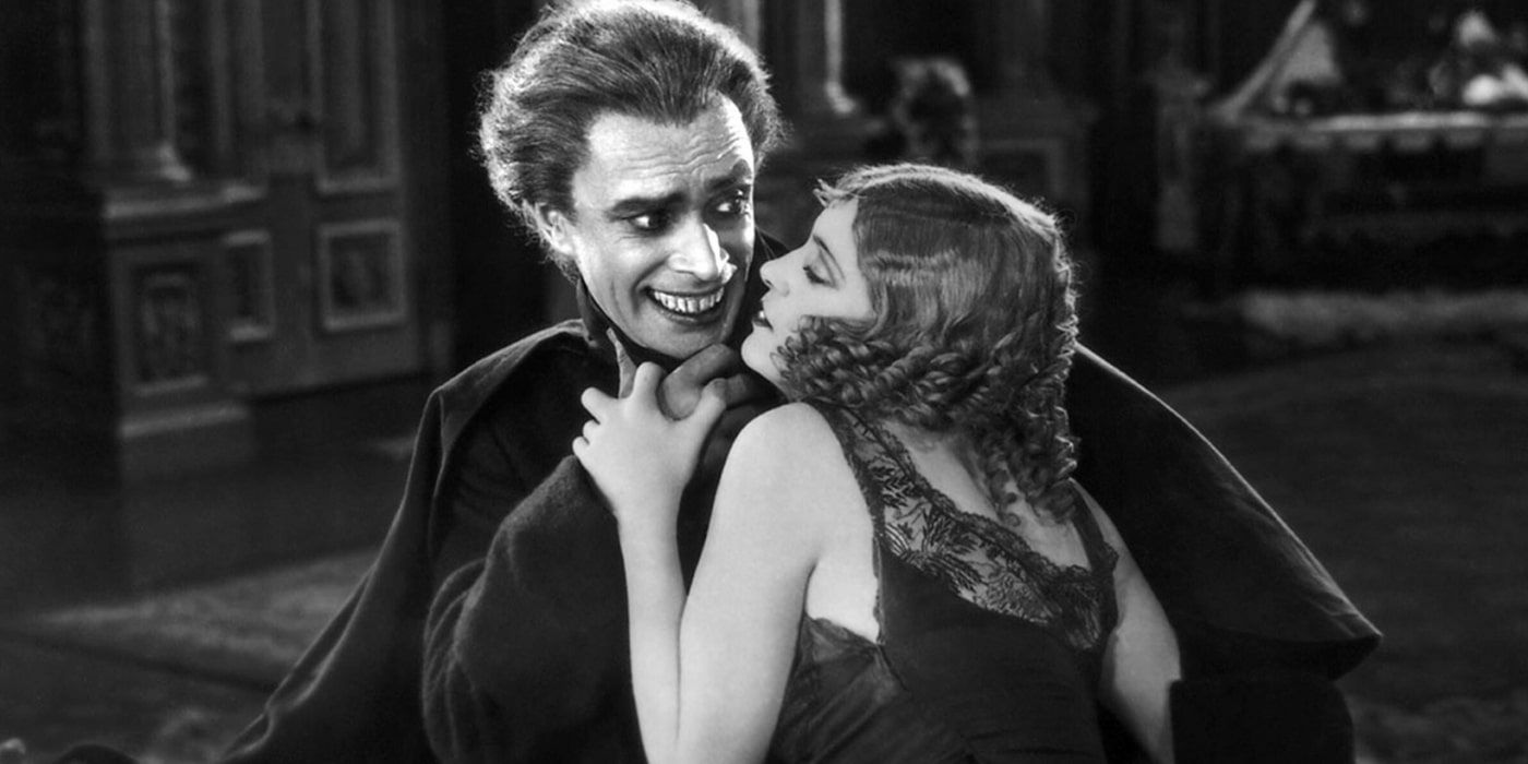 Gwynplaine (Conrad Veidt) e Dea (Mary Philbin) no homem que ri (1928).