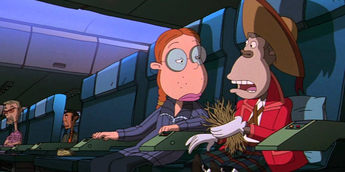 Eliza (Lacey Chabert) está en un avión al lado de su chimpancé, Darwin (Tom Kane), en la película Wild Thornberrys.