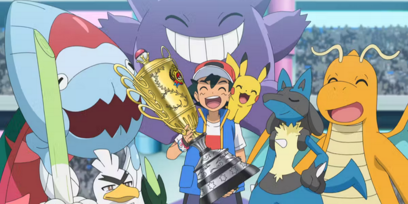 Ash Ketchum está ao lado da equipe com quem venceu o campeonato mundial no anime Pokemon.