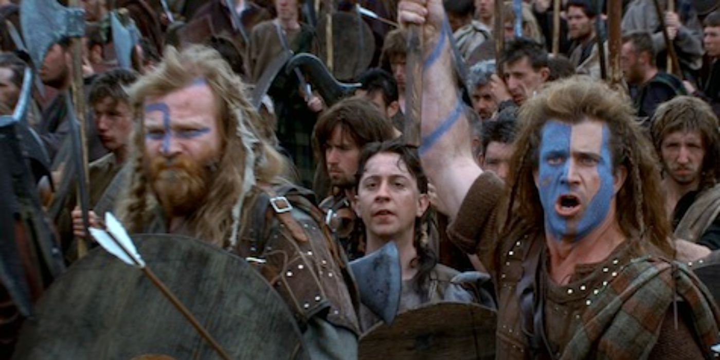 Mel Gibson como William Wallace, Brendan Gleeson como Hamish e mais prestes a se envolver em uma batalha de Braveheart