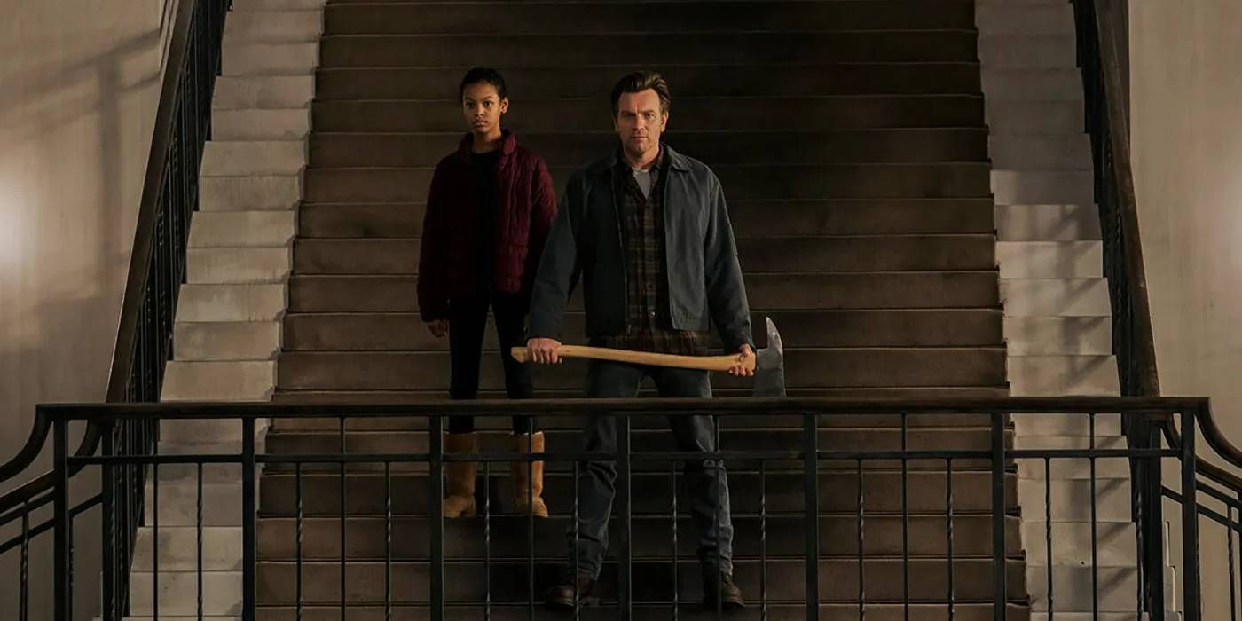 Danny guards the staircase with an axe in Doctor Sleep