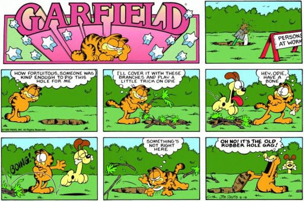 Odie trata Garfield com um buraco falso.