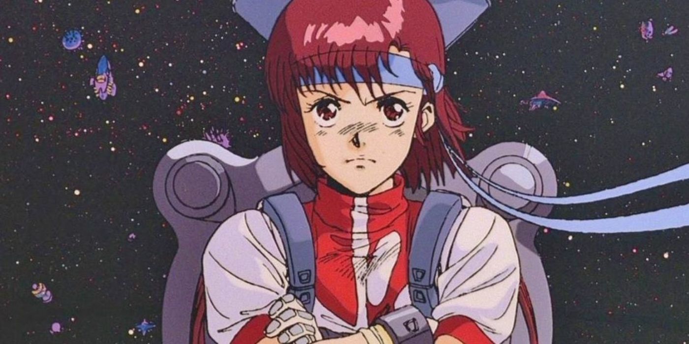 Noriko con los brazos doblados en el espacio listos para combatir a Mecha en Gunbuster.