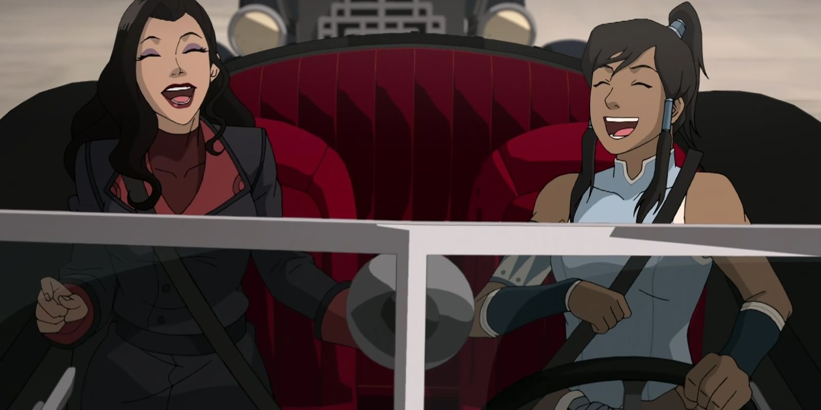 Korra e Asami riem enquanto Korra dirige um carro.