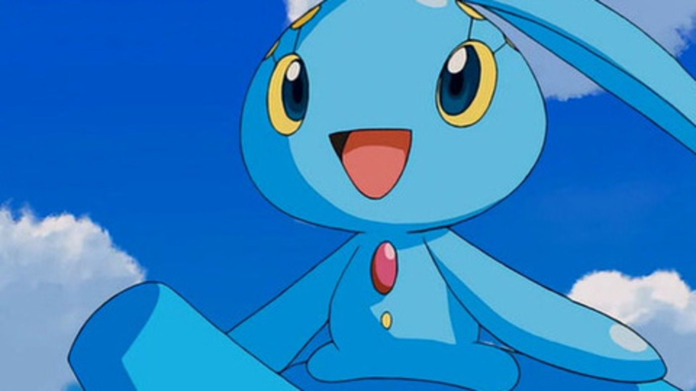 Manaphy, felizmente, senta -se enquanto monta na cabeça de Lapras.