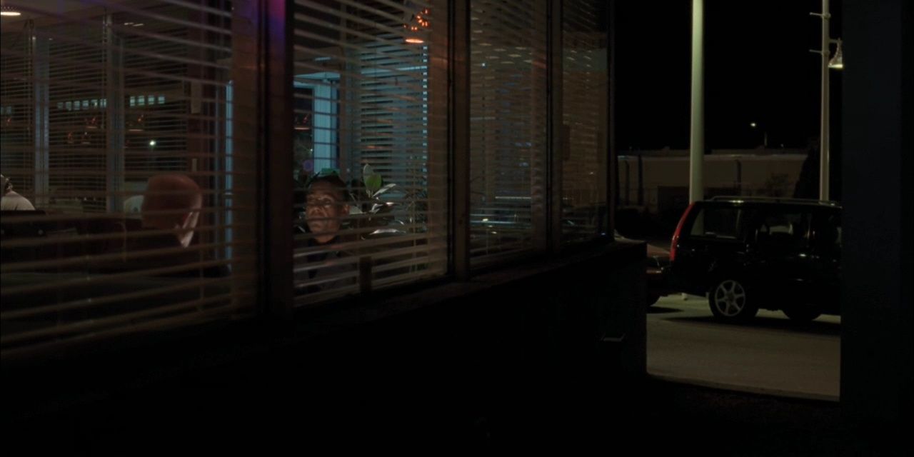 Mike talks with Gus at Loyola's in Breaking Bad