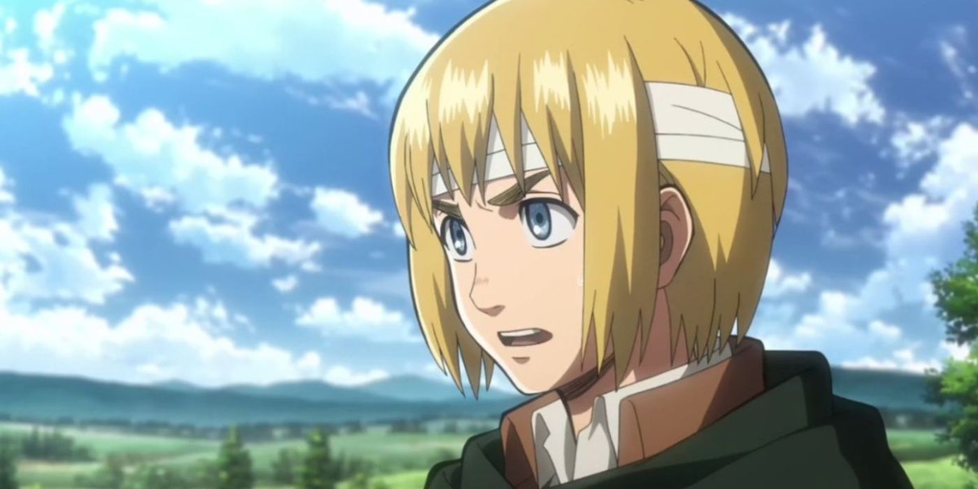 Armin Arlert with a stern expression and bandages around his head.