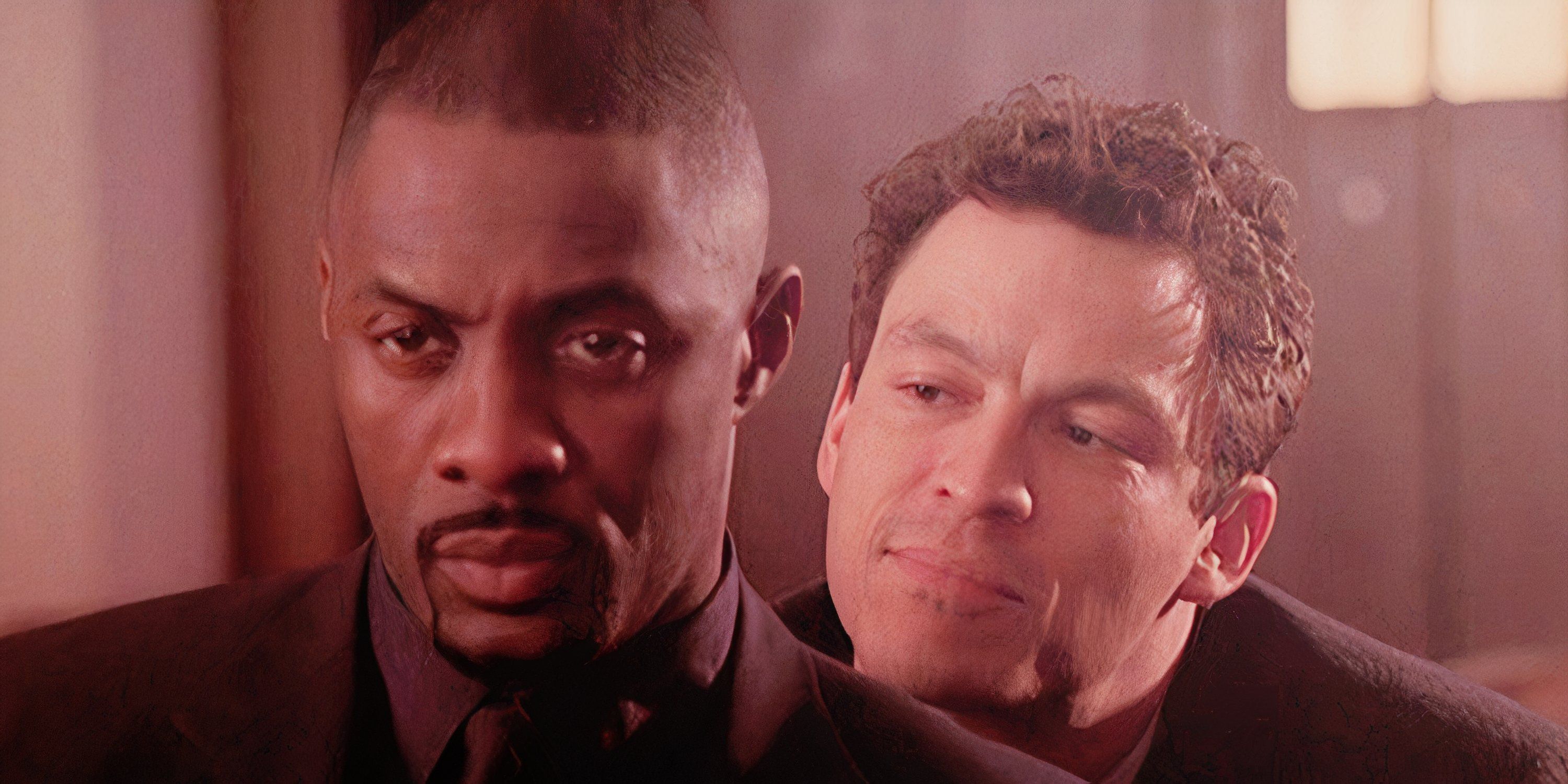 Jimmy McNulty (Dominic West) olha para Stringer Bell (Idris Elba) por trás do fio.