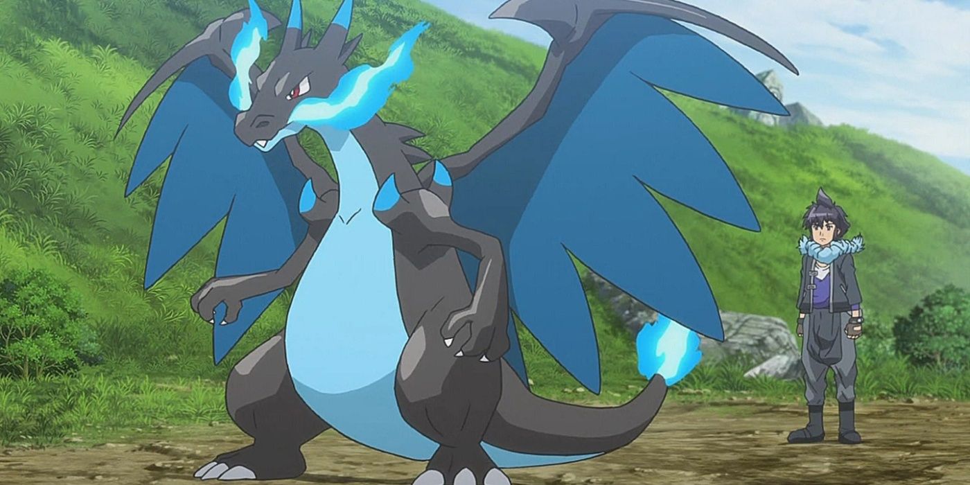 Mega Charizard X de pie frente a tu entrenador en el anime.