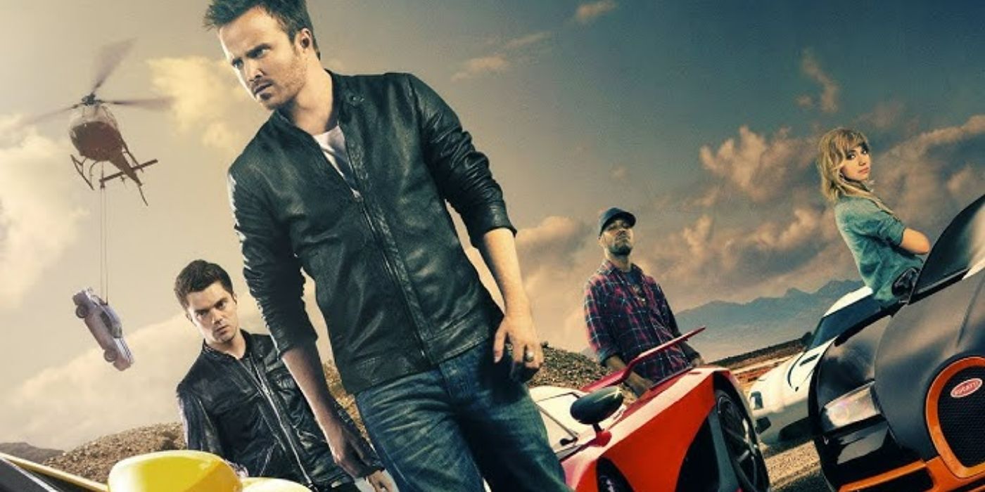 Aaron Paul ve Speed ​​For Speed'in kadrosu spor arabaların yanında duruyor