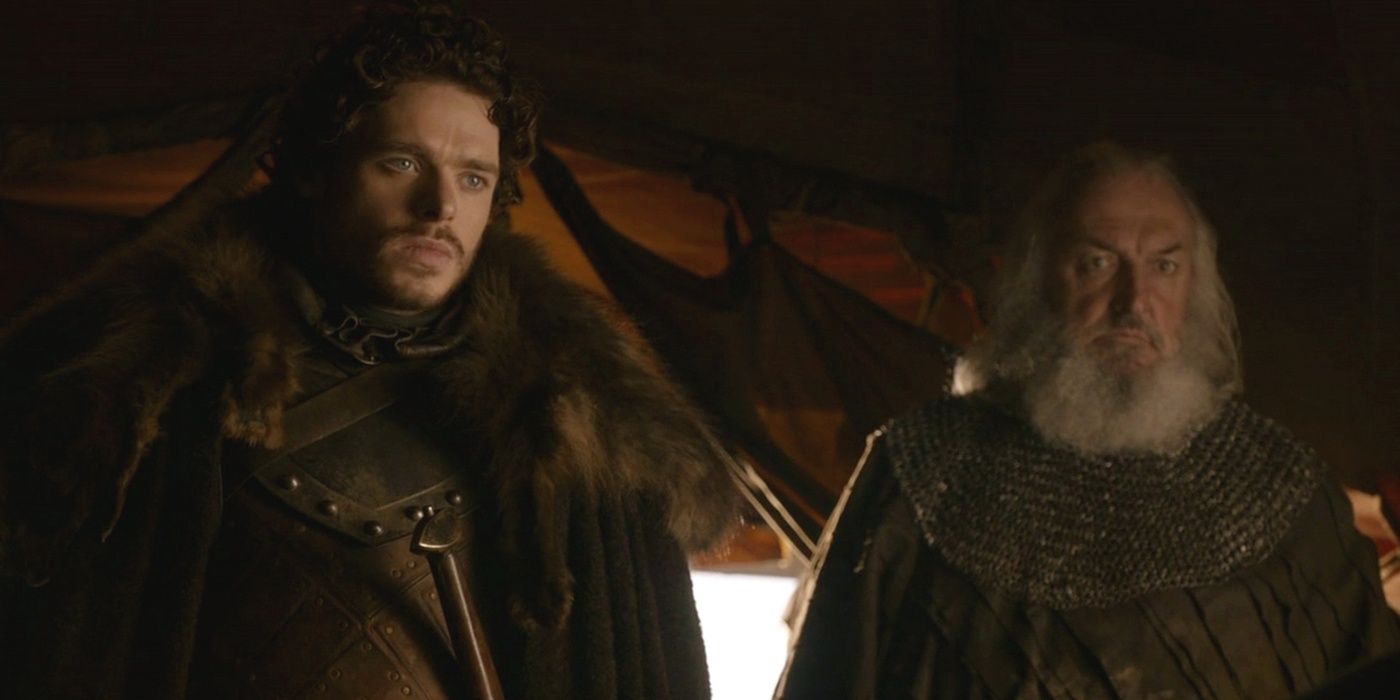 Richard Madden as Robb Stark and John Stahl as Rickard Karstark in Game of Thrones