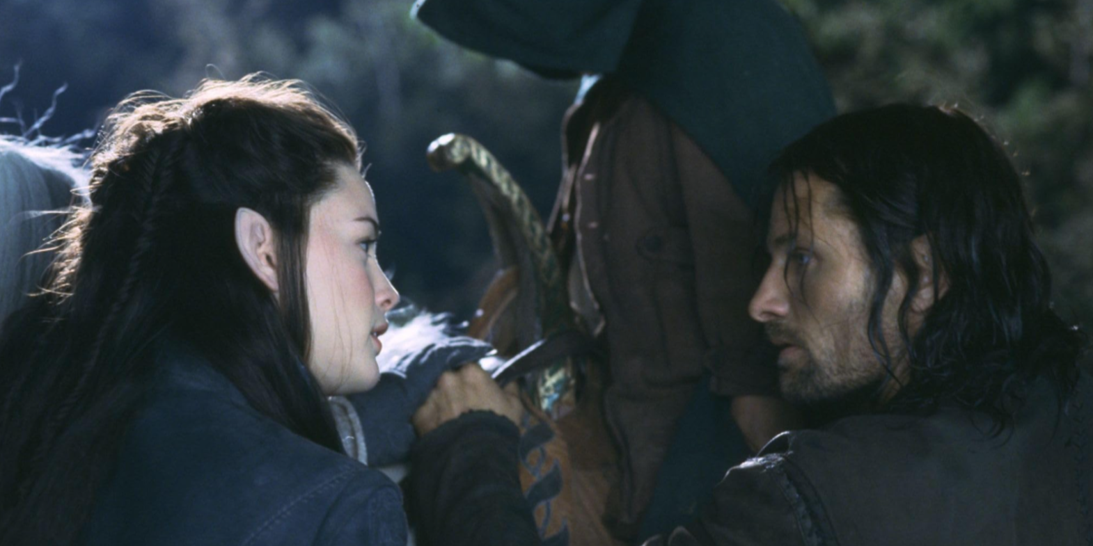 Arwen ve Aragorn, Frodo'yu ring bursu için Rivendell'e kim götürmesi gerektiğini tartışıyor.